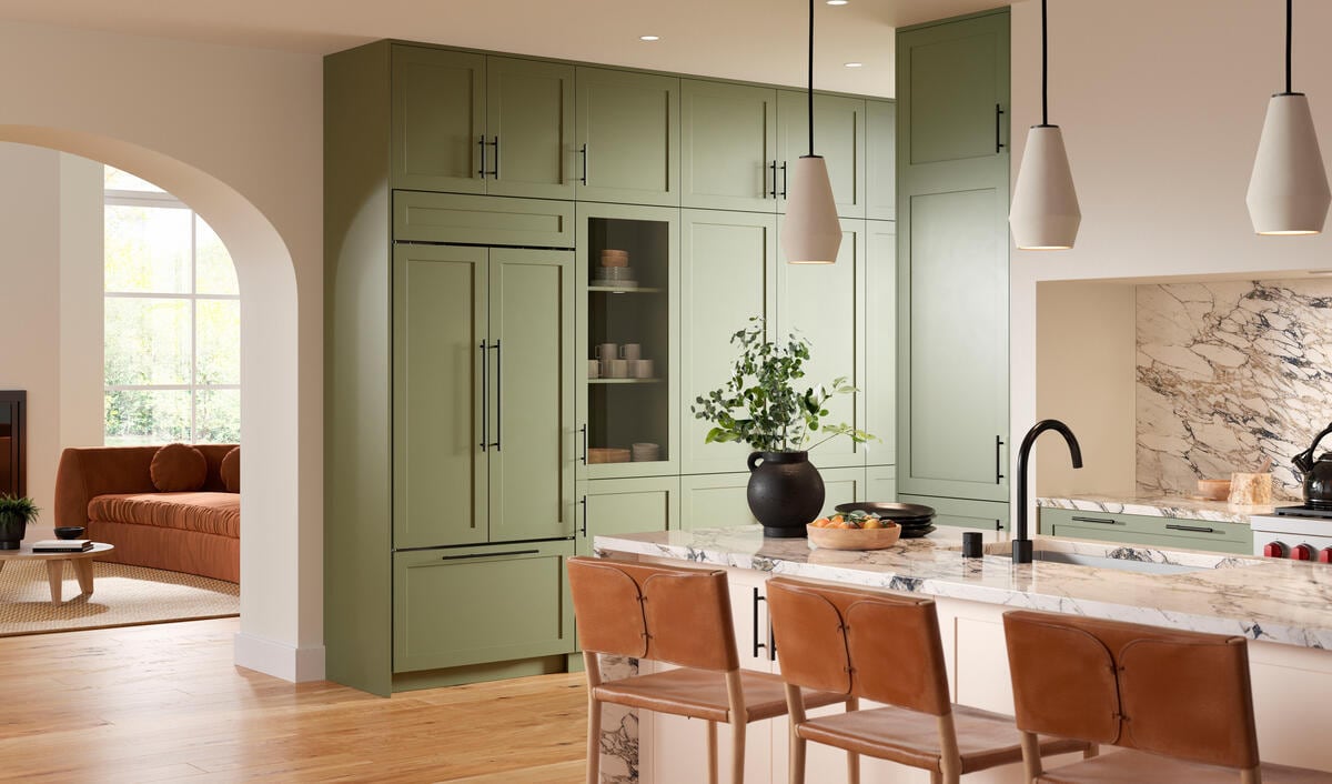 Sub-Zero Lifestyle Kitchen view featuring refrigerator model CL3650UFD/O with custom green panels, overlay flush install