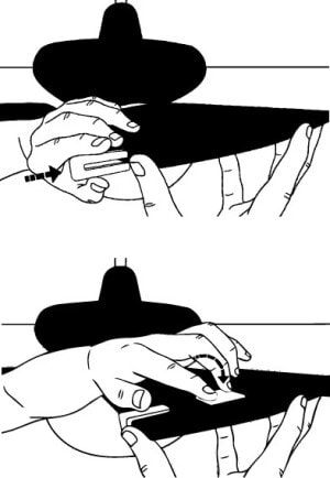 Two frames of illustration, one showing a balancing clip being slid onto a ceiling fan blade, and the other showing a balancing weight being adhered to the top of the blade